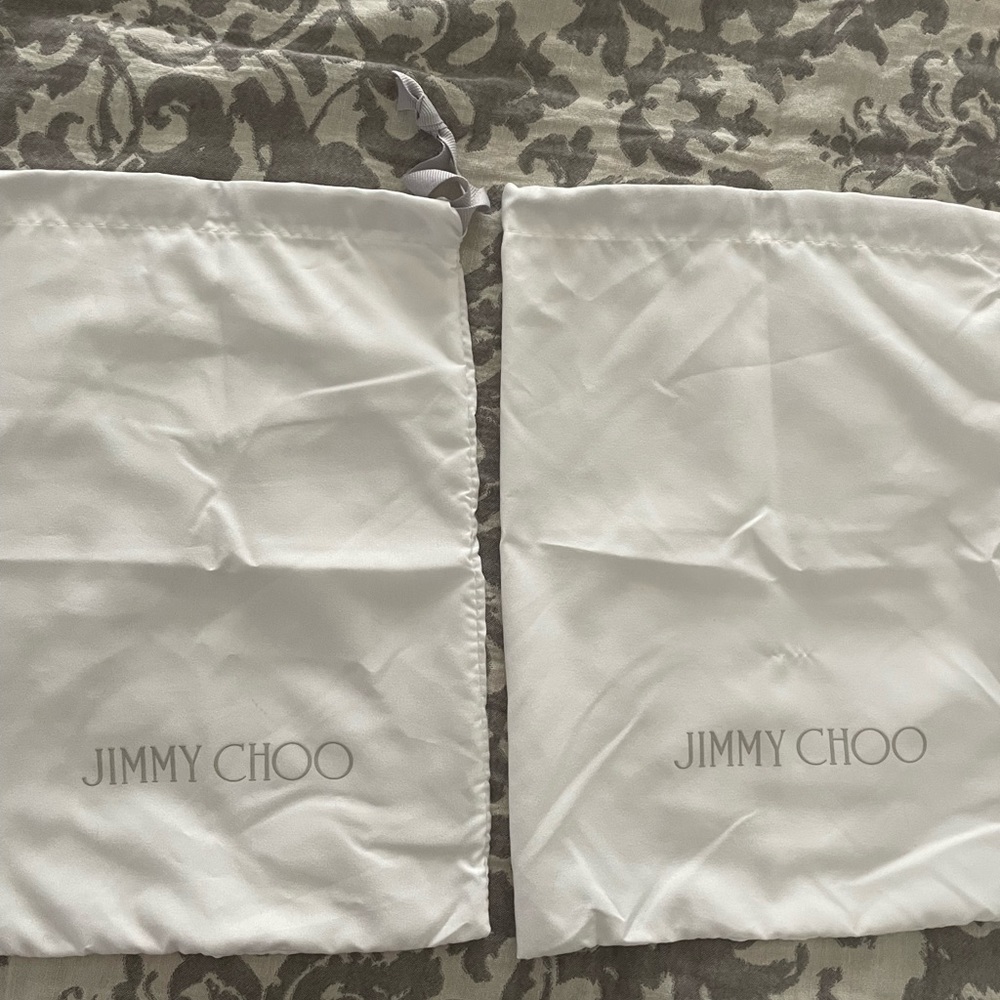 Two Jimmy Choo shoe dust bags